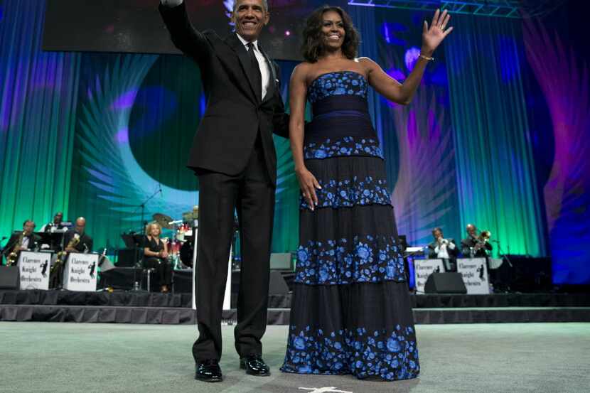 FILE - In this Sept. 19, 2015 file photo, President Barack Obama and first lady Michelle...