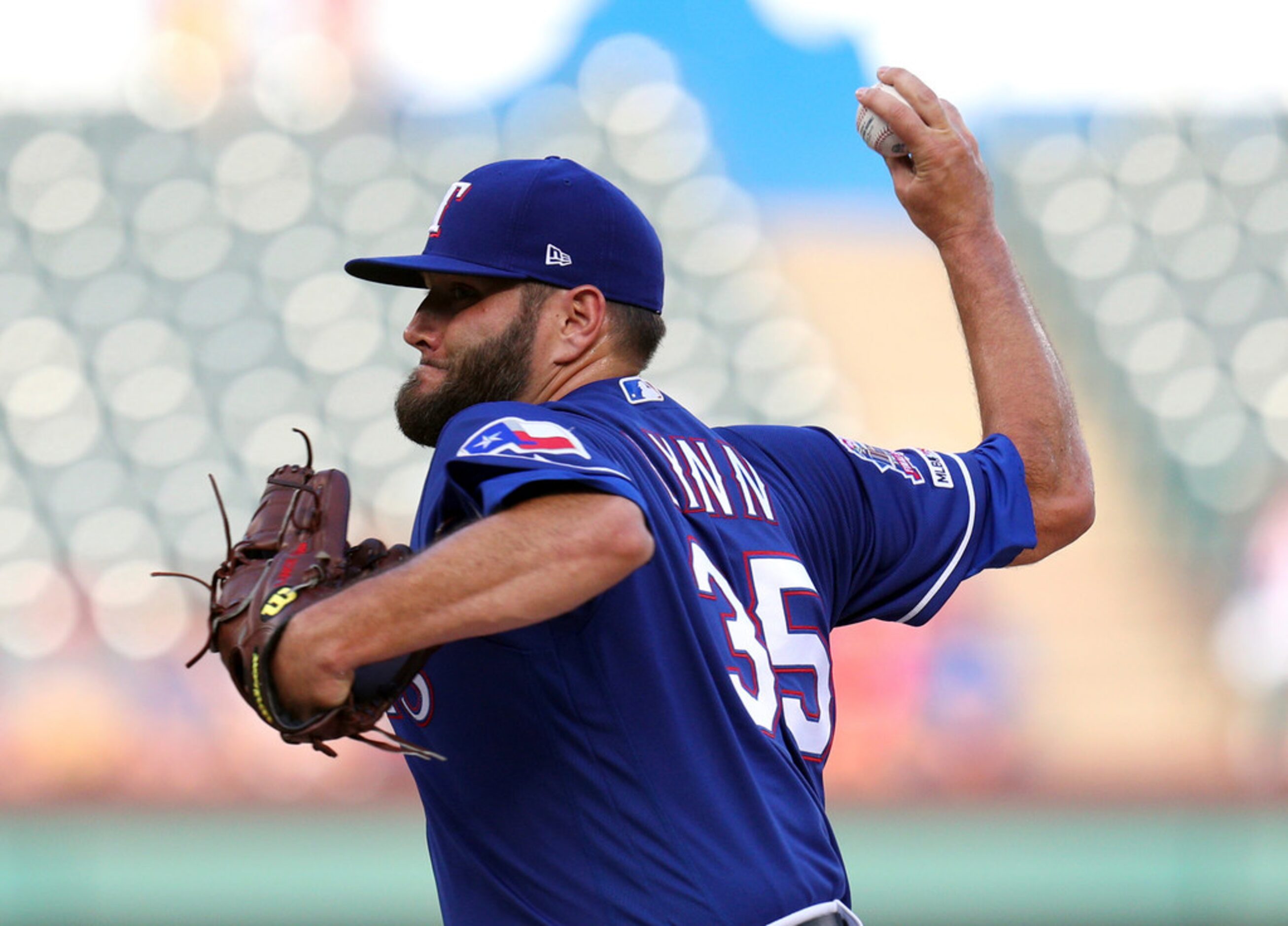 Texas Rangers starting pitcher Lance Lynn (35) delivers against the Arizona Diamondbacks in...