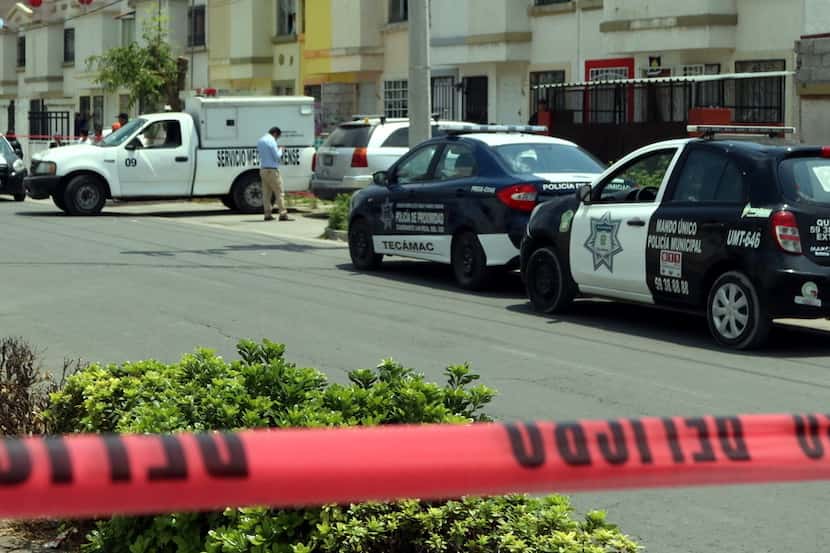 Policía del Estado de México fue llamada por el asesinato de dos personas. AGENCIA REFORMA
