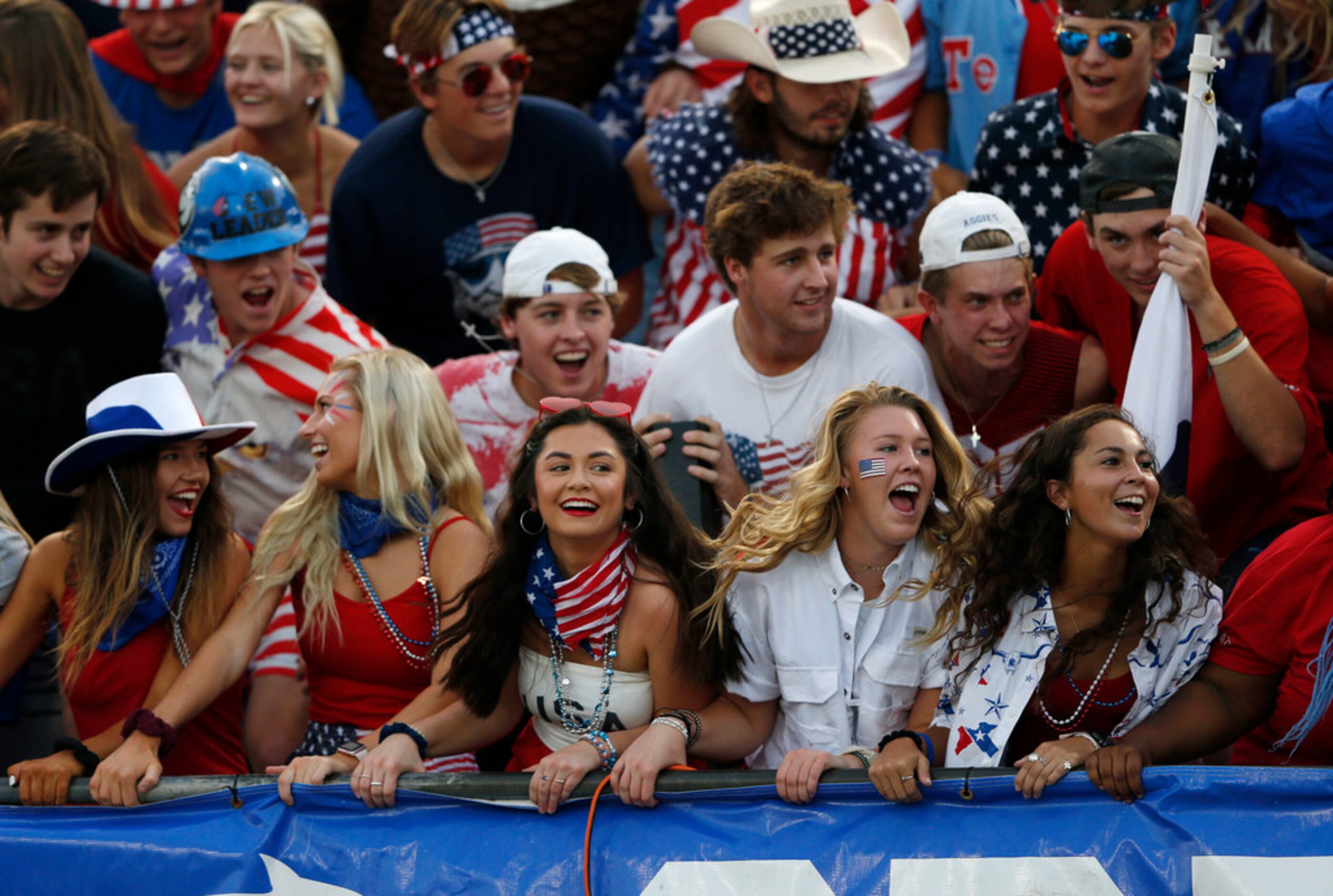 Denton Guyer fans sway back and forth as the team prepares to take the field before playing...