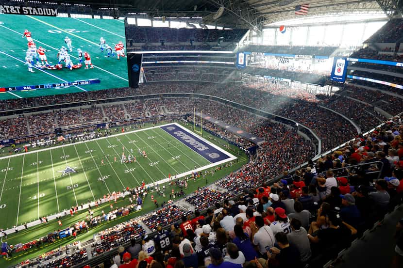 The sunlight streams into AT&T Stadium through the sliding glass doors during the Dallas...