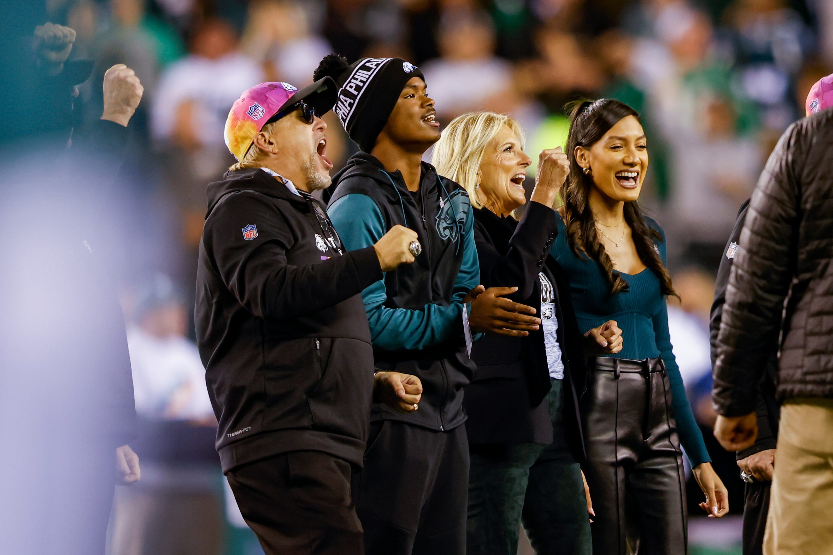 First Lady Jill Biden (second to right) on the field before the start of a Dallas Cowboys at...