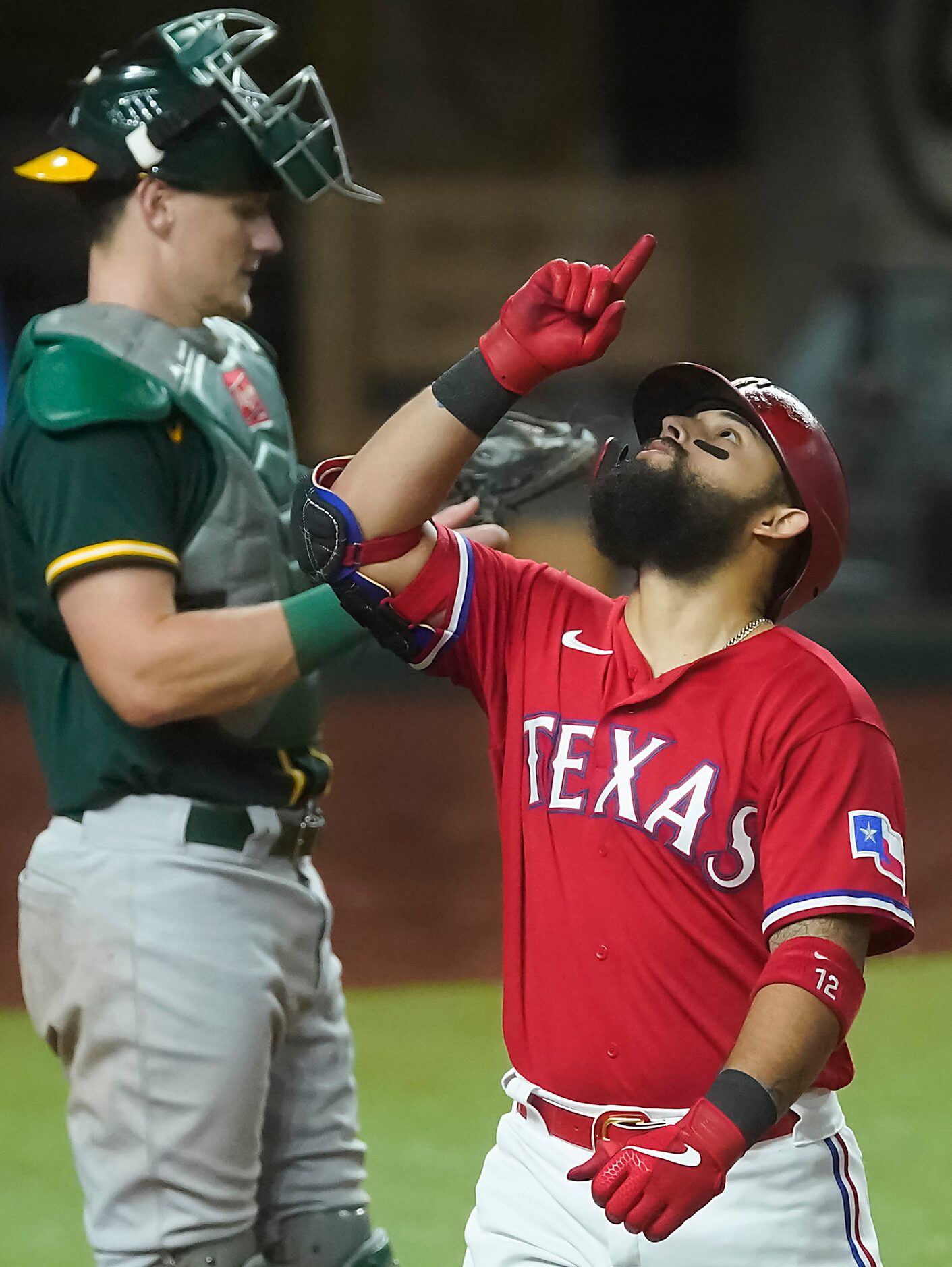 Texas Rangers second baseman Rougned Odor celebrates after hitting a 2-run home run during...