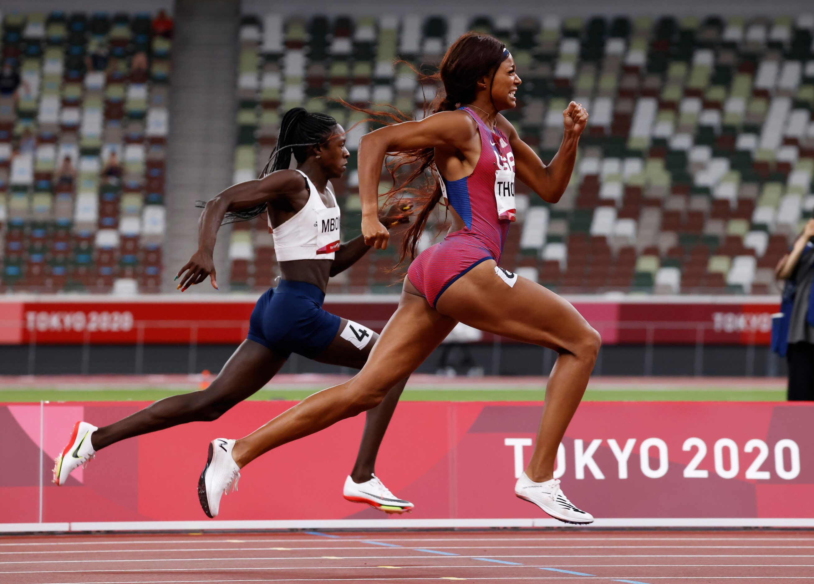 USA’s Gabrielle Thomas competes in the women’s 200 meter semifinal during the postponed 2020...