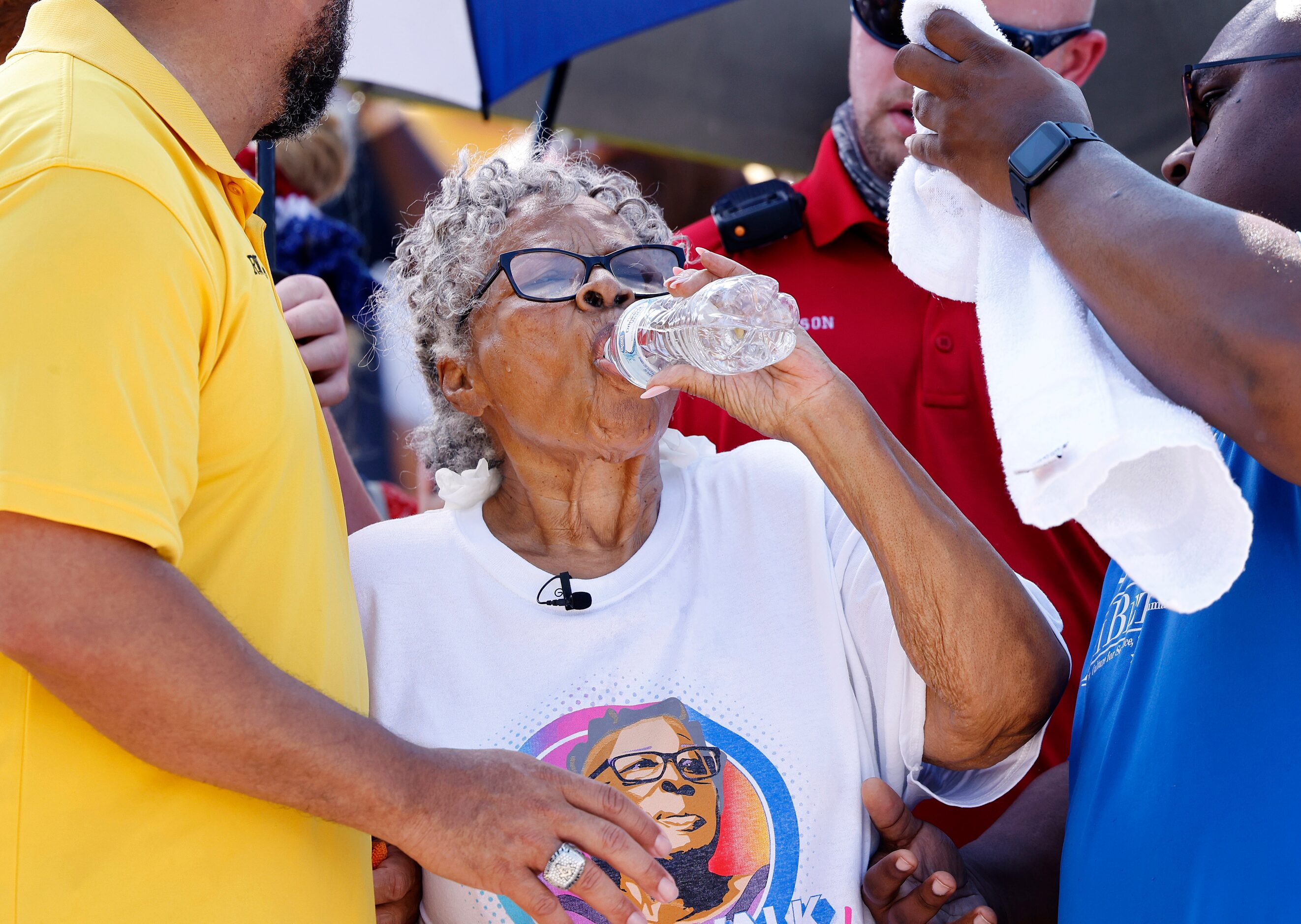 Opal Lee made several water and cooling stops as she received a shaded escort during her hot...