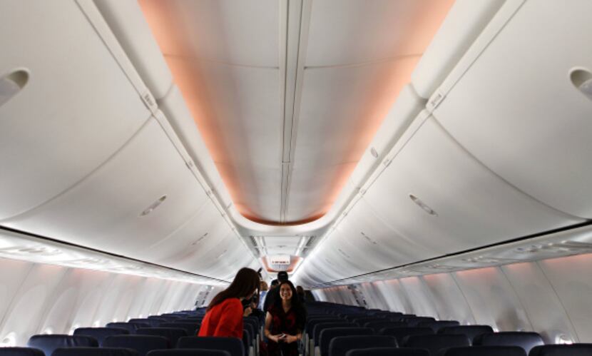 Southwest Airlines employees toured a passenger cabin at a launch party in March for the...
