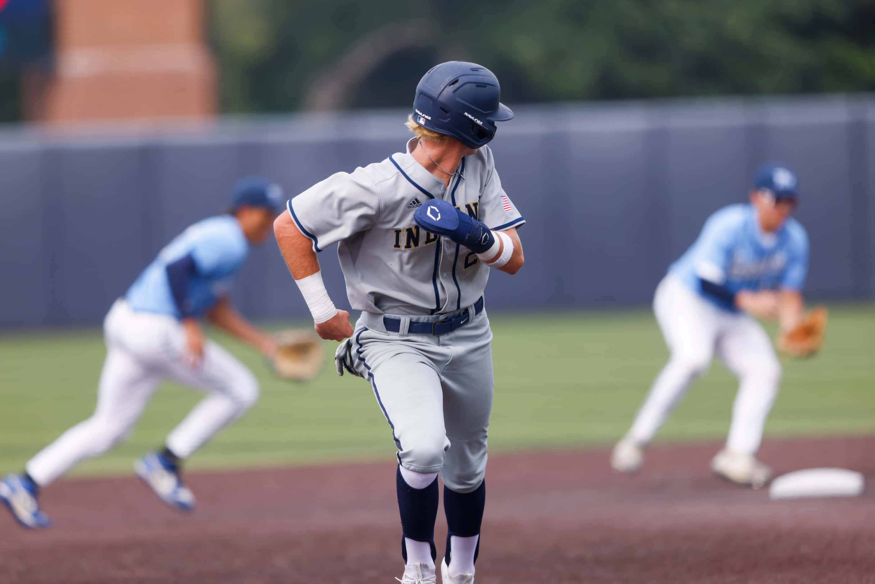 Keller’s Cole Koeninger (21) looks back as he runs to third base during Game 3 of a...