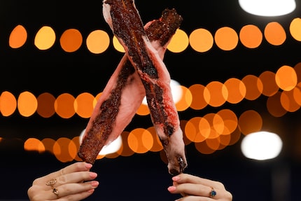 Rousso’s Cotton Candy Bacon on a Stick is a loud and proud new concession item at the State...