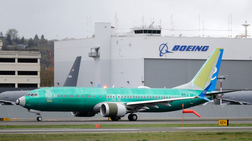 In this April 2019 file photo, a Boeing 737 MAX 8 airplane rolled toward takeoff before a...