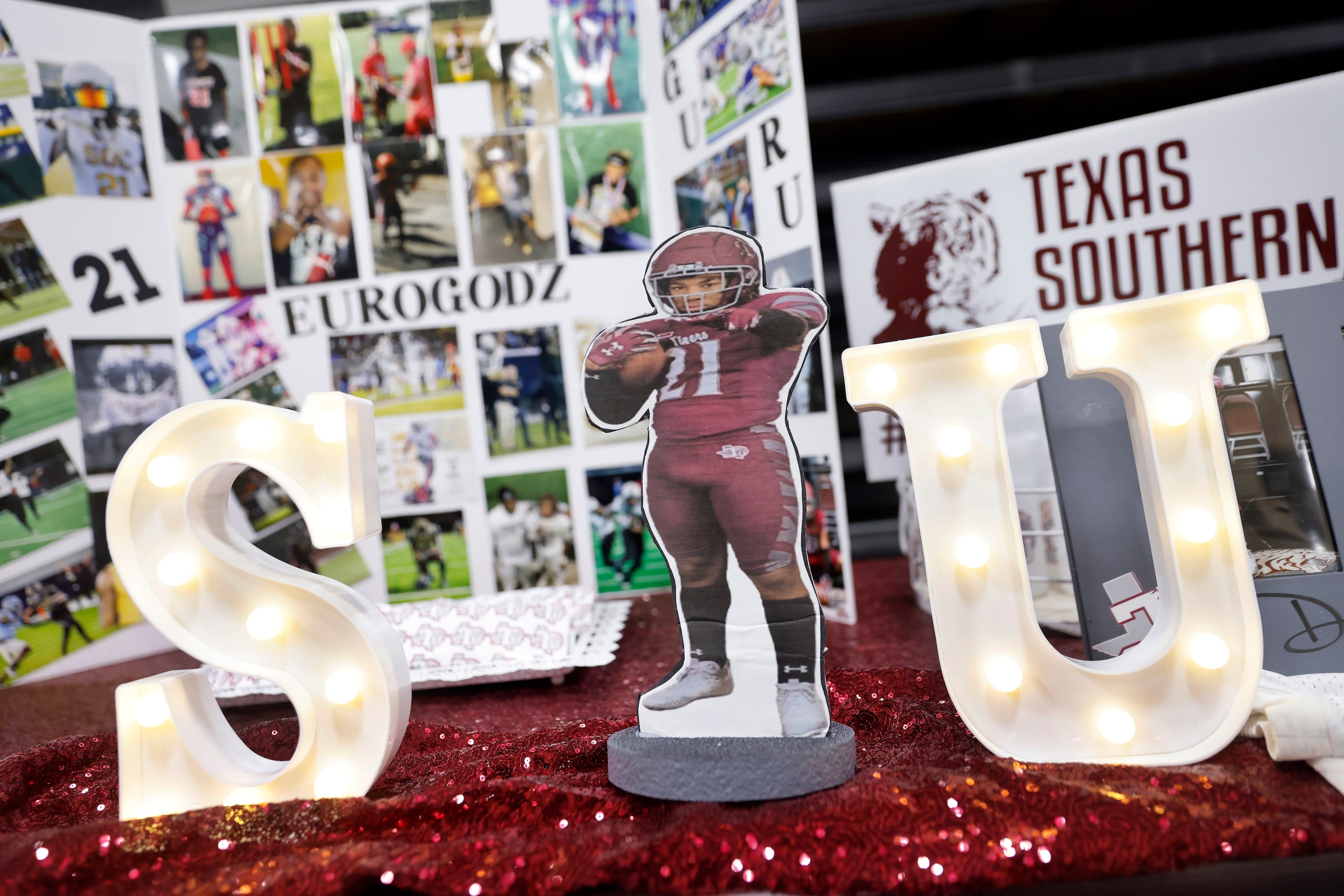 A display put together by family shows South Oak Cliff football player Danny Green Jr during...