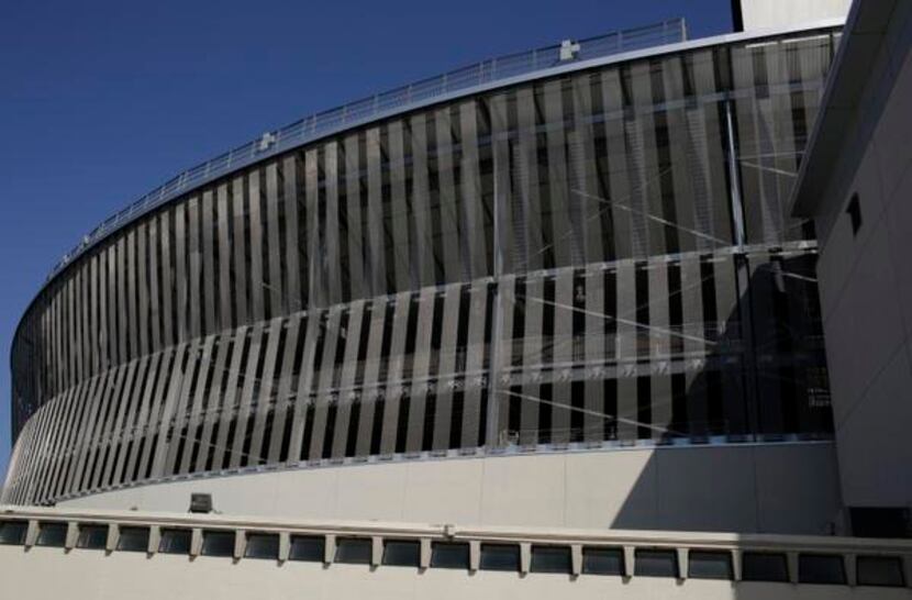 
An exterior shot of James Carpenter's gift-wrapping of the Cotton Bowl in a metal veil in...