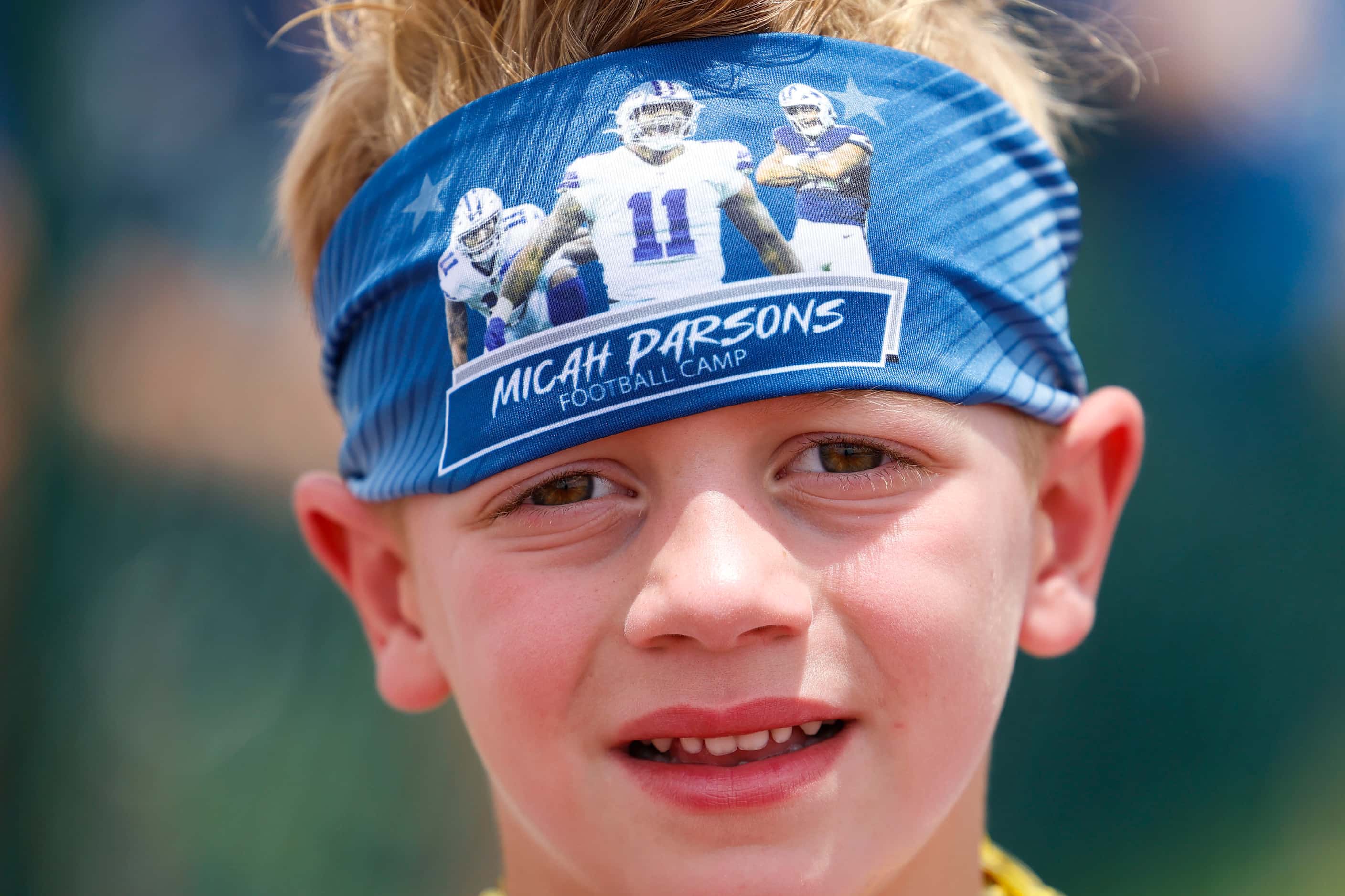 Oliver McGrath, 6, wears a Dallas Cowboys linebacker Micah Parsons headband during player...