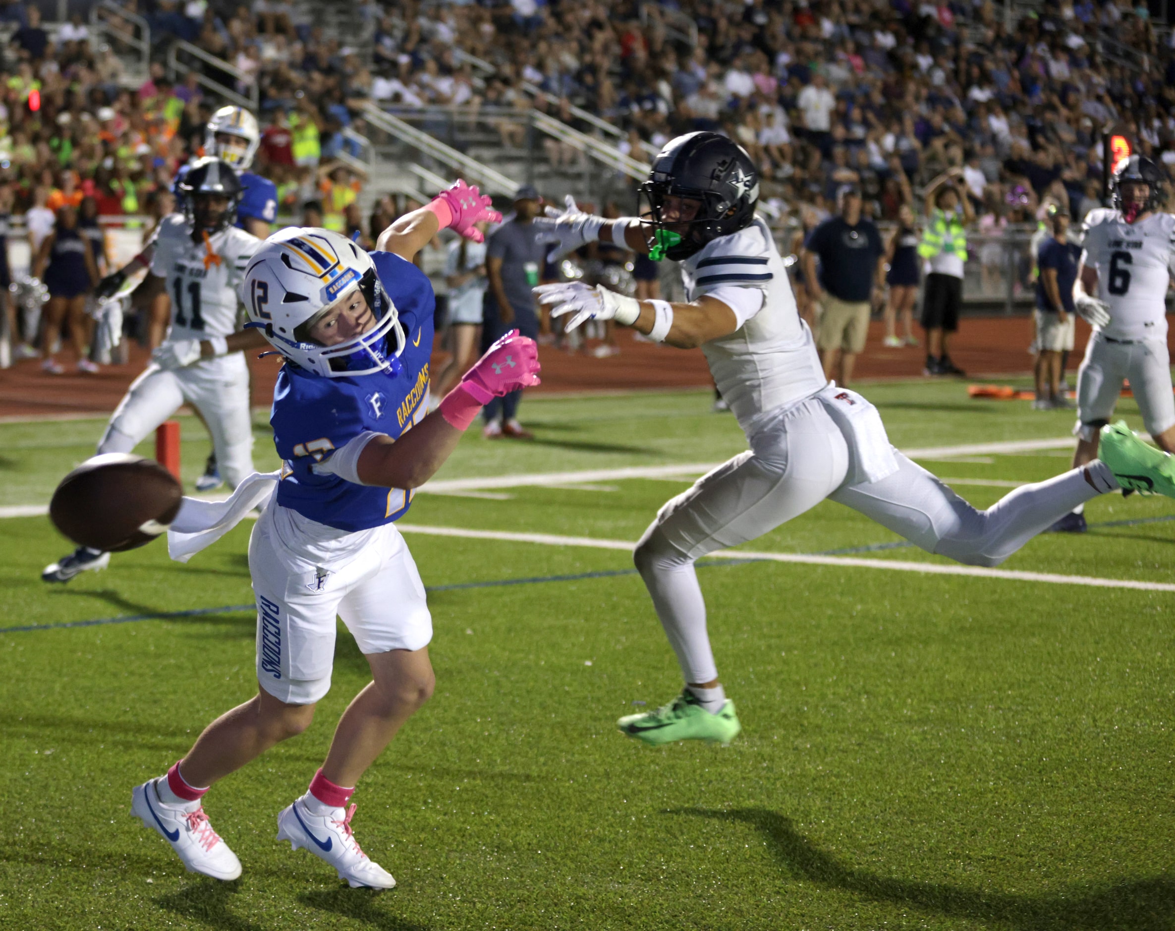 Frisco player #12 Brenden Bounds comes up a little short of receiving a touchdown pass...