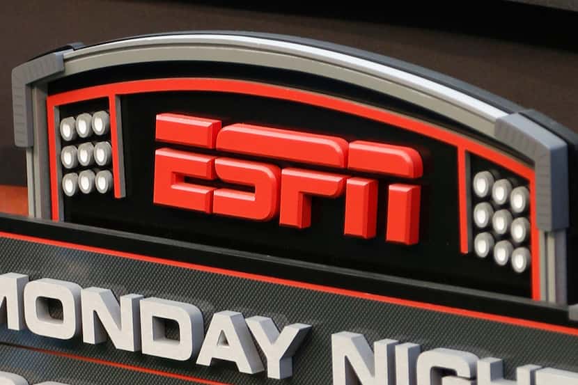 This Sept. 16, 2013 photo shows the ESPN logo prior to an NFL football game between the...