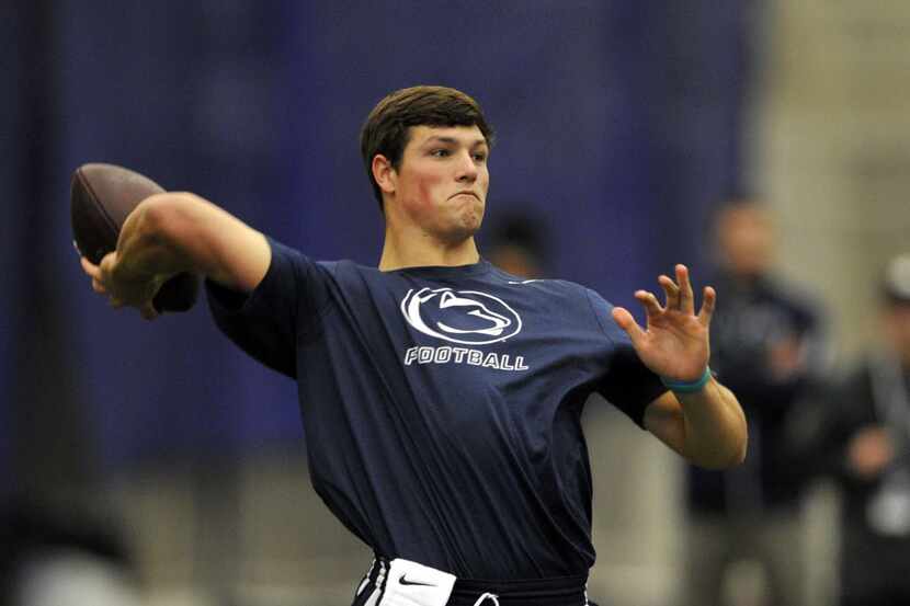 Penn State's quarterback Christian Hackenberg throws in front of the scouts during Pro Day...