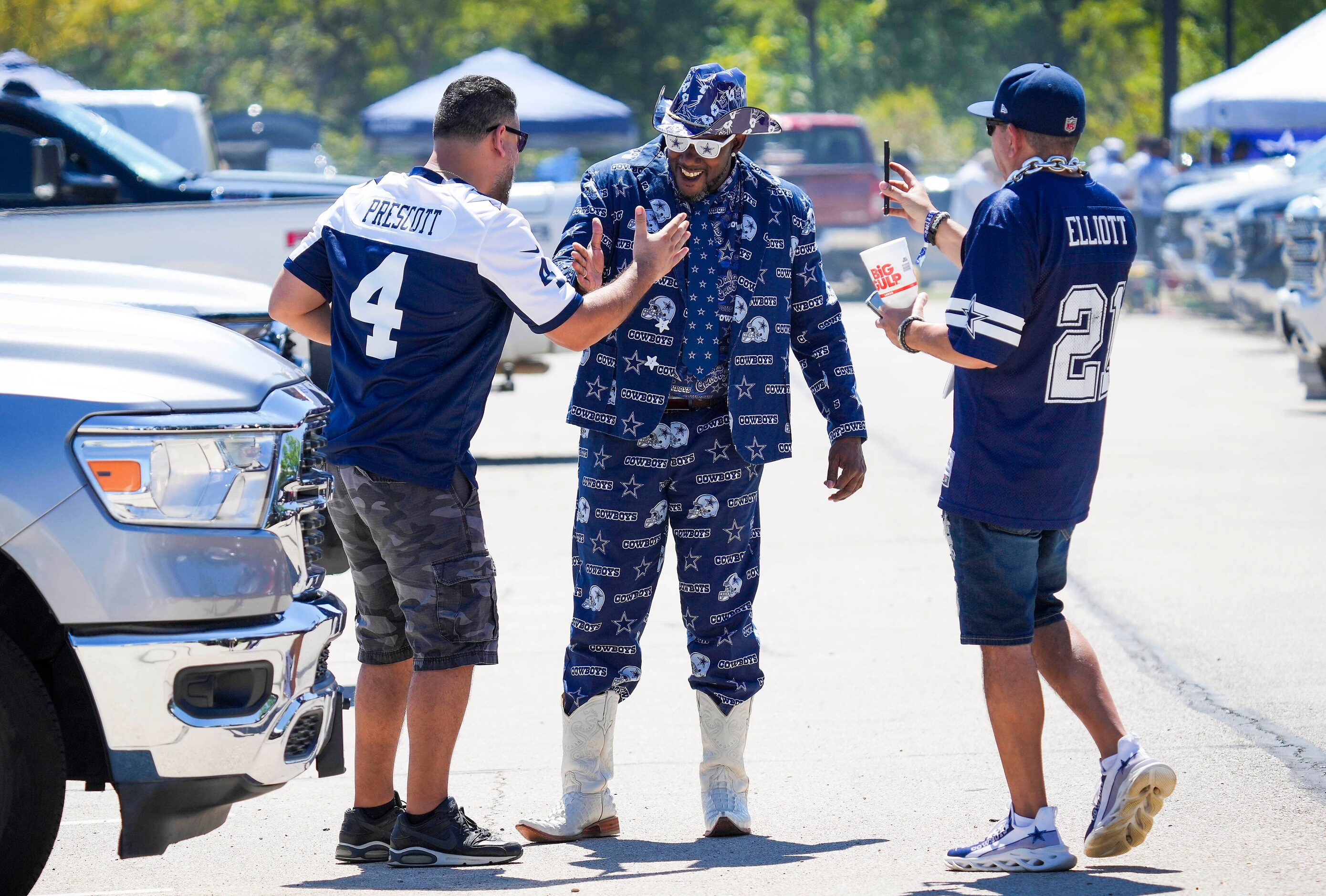 Dallas Cowboys fan Edwin Fox, of Tampa, Fla., wears a complete Cowboys suit as he greets...