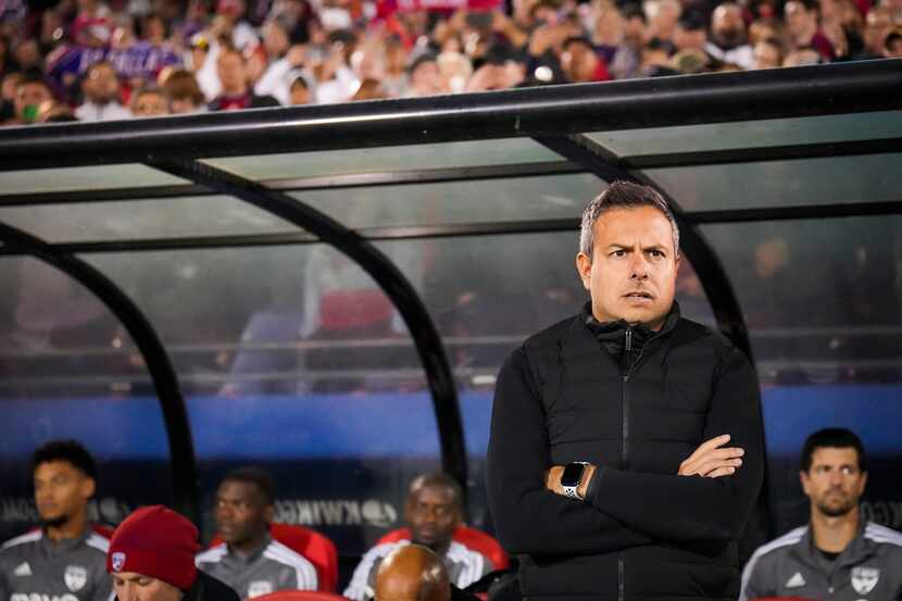 FC Dallas coach Nico Estévez looks out from the bench before an MLS playoff soccer match...