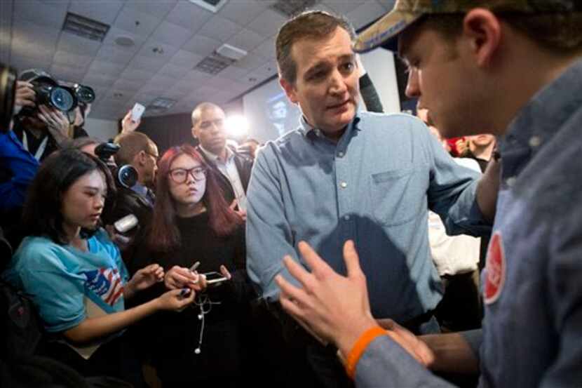  Sen. Ted Cruz speaks with supporters at a campaign event Saturday in Ames, Iowa. (AP/Mary...