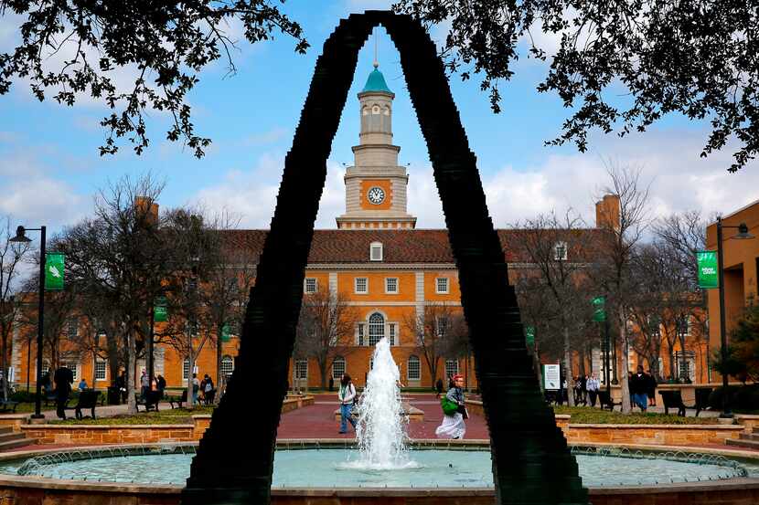 The University of North Texas  Administration Building is seen through a piece of artwork...