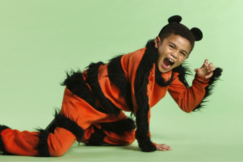 Jonathan McSween, 7, in character as a tiger for Parent's Guide to Summer, photographed...