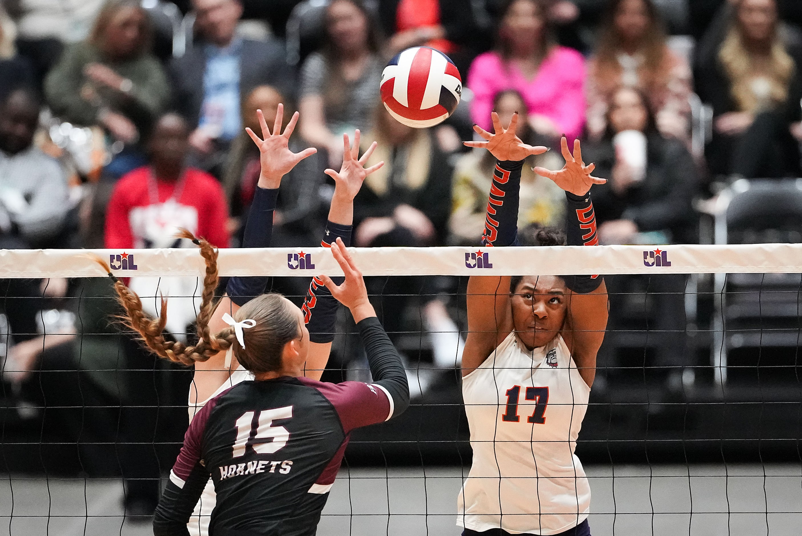 Corpus Christi Flour Bluff's Margaret Croft (15) hits around the block of McKinney North's...