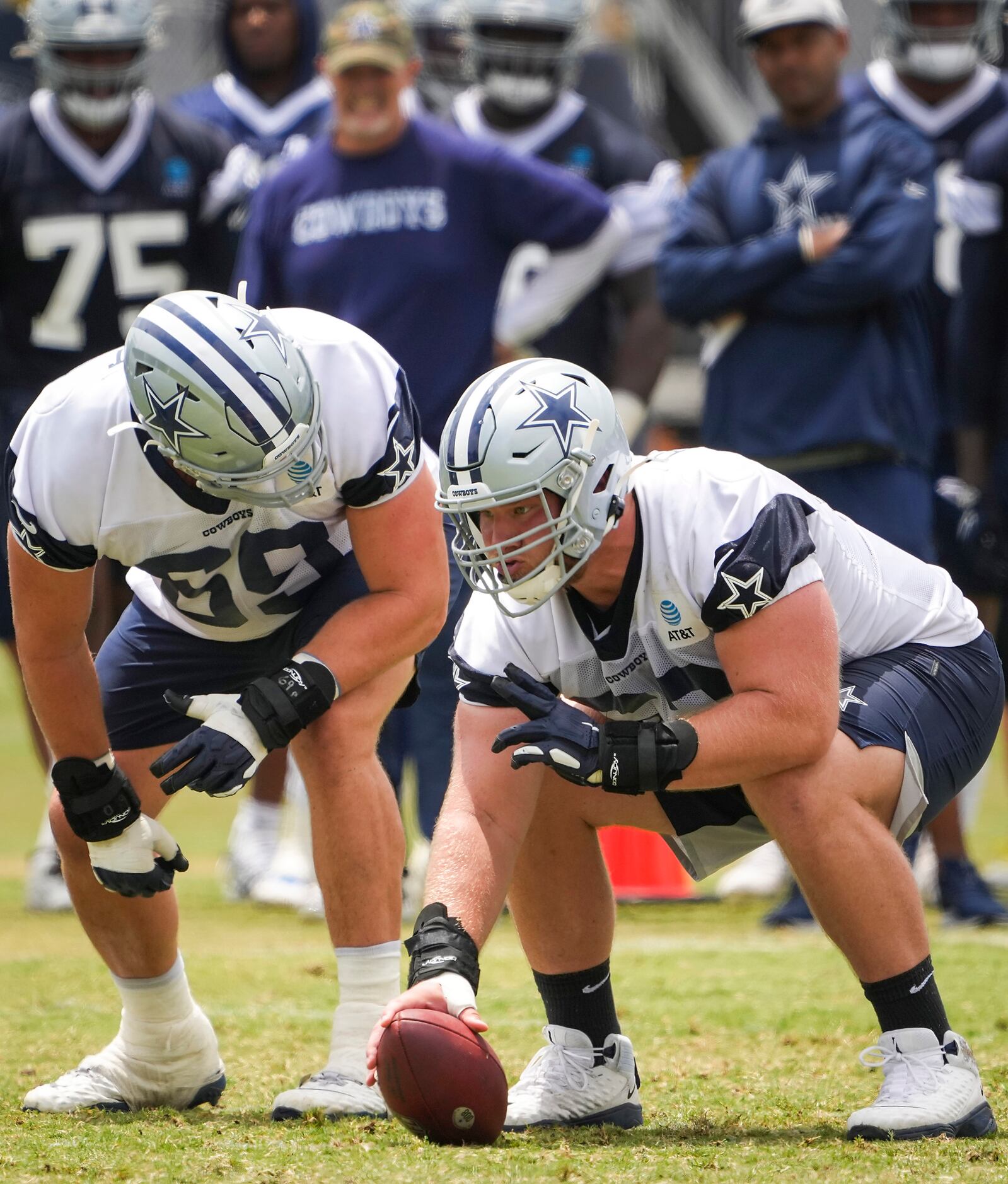 Dallas Cowboys guard Connor Williams (52) prepares to make a snap at center as he lines up...
