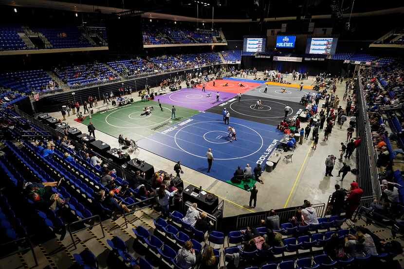 Wrestlers compete in during the UIL State Wrestling tournament at the Berry Center on...