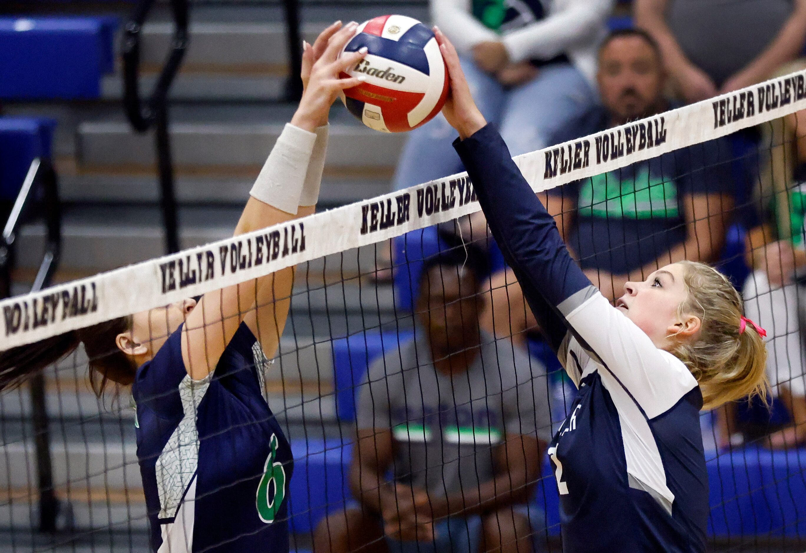 Eaton High’s Payton Sandifer (6 ,left) and Keller High’s Taylor Polivka (2) battle at the...