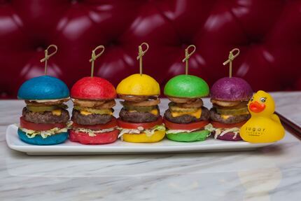 The Rainbow Sliders, an appetizer for $25 at Sugar Factory, are a colorful array of little...