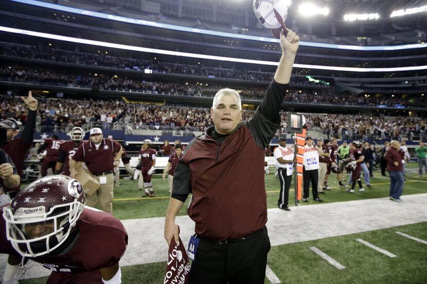 FILE - Ennis coach Jack Alvarez celebrates with his team in the final seconds of the UIL 5A...