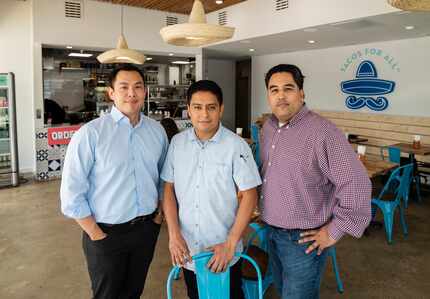 Co-owner Joon Choe, left, chef Juan Ascanio, center, and co-owner Mohammad Qasim run Public...