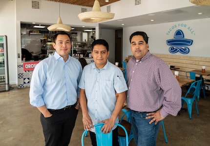 Co-owner Joon Choe, left, chef Juan Ascanio, center, and co-owner Mohammad Qasim run Public...