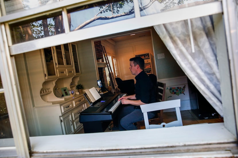 Brad Hanson, who has been playing the piano at NorthPark Mall for 11 years, plays the piano...