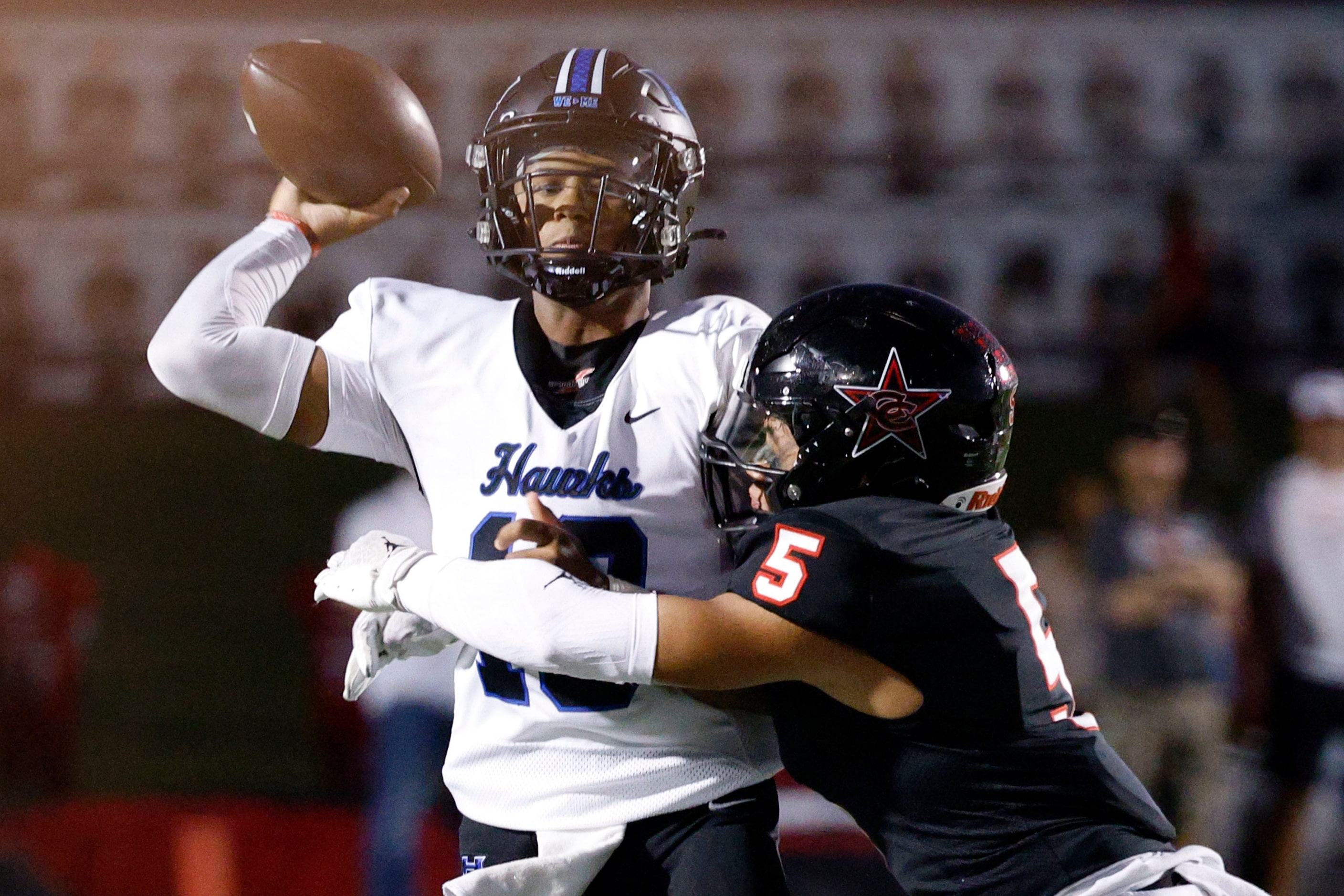 Hebron's quarterback Patrick Crayton Jr. (10) passes under pressure from Coppell's Noah...