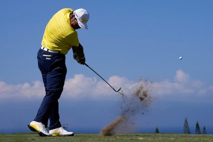 Hideki Matsuyama, of Japan, hits off the 11th tee during the final round of The Sentry golf...