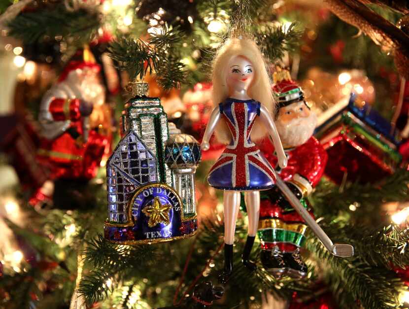 Ornaments hang on a Christmas tree at the home of Carolyn Tillery.