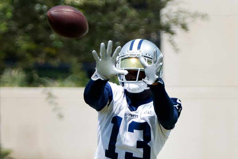 Dallas Cowboys wide receiver Michael Gallup (13) catches a pass as he ran routes with the...