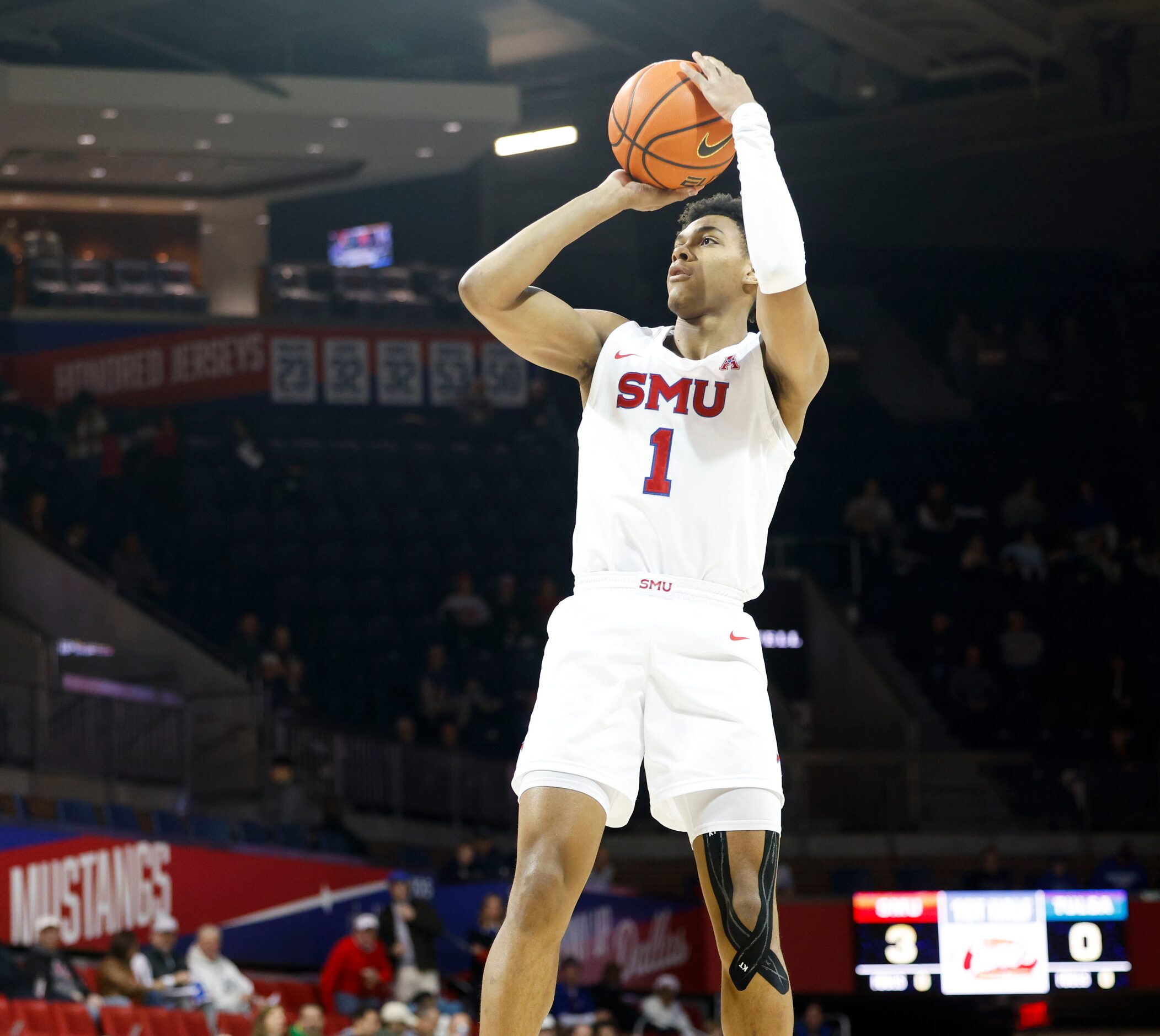 Southern Methodist guard Zhuric Phelps shoots a three pointer against the Tulsa during the...