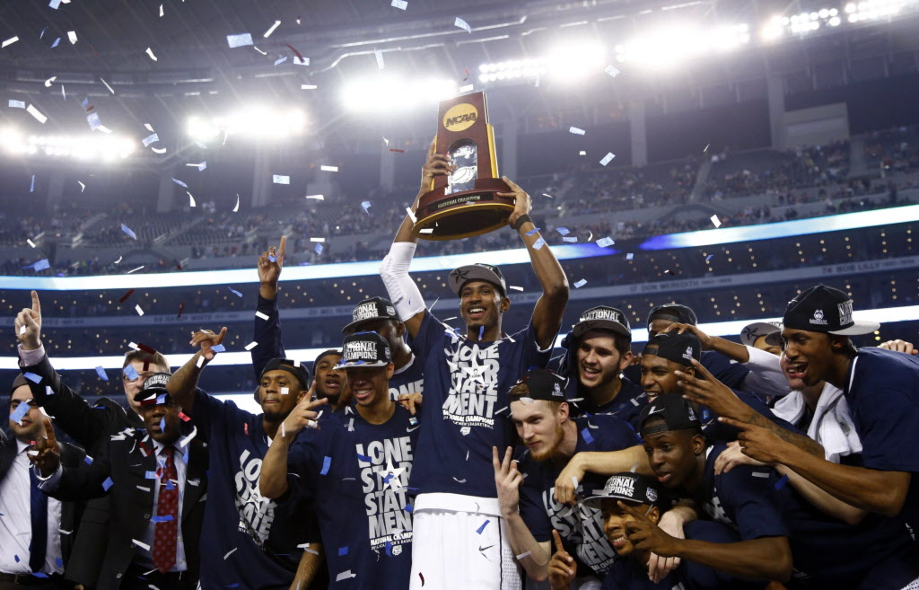 Connecticut Huskies forward DeAndre Daniels (2) and teammates celebrate a victory after...