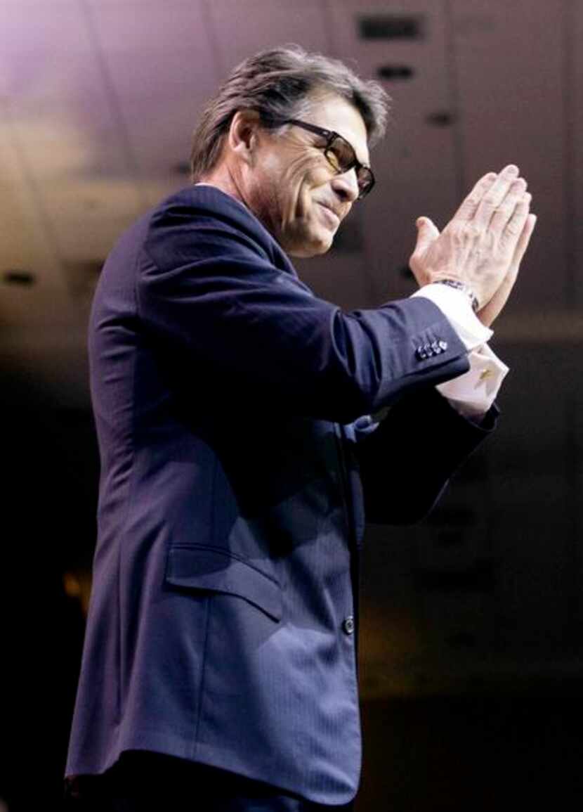 
Gov. Rick Perry touted Texas’ successes, as well as those of his fellow Republican...