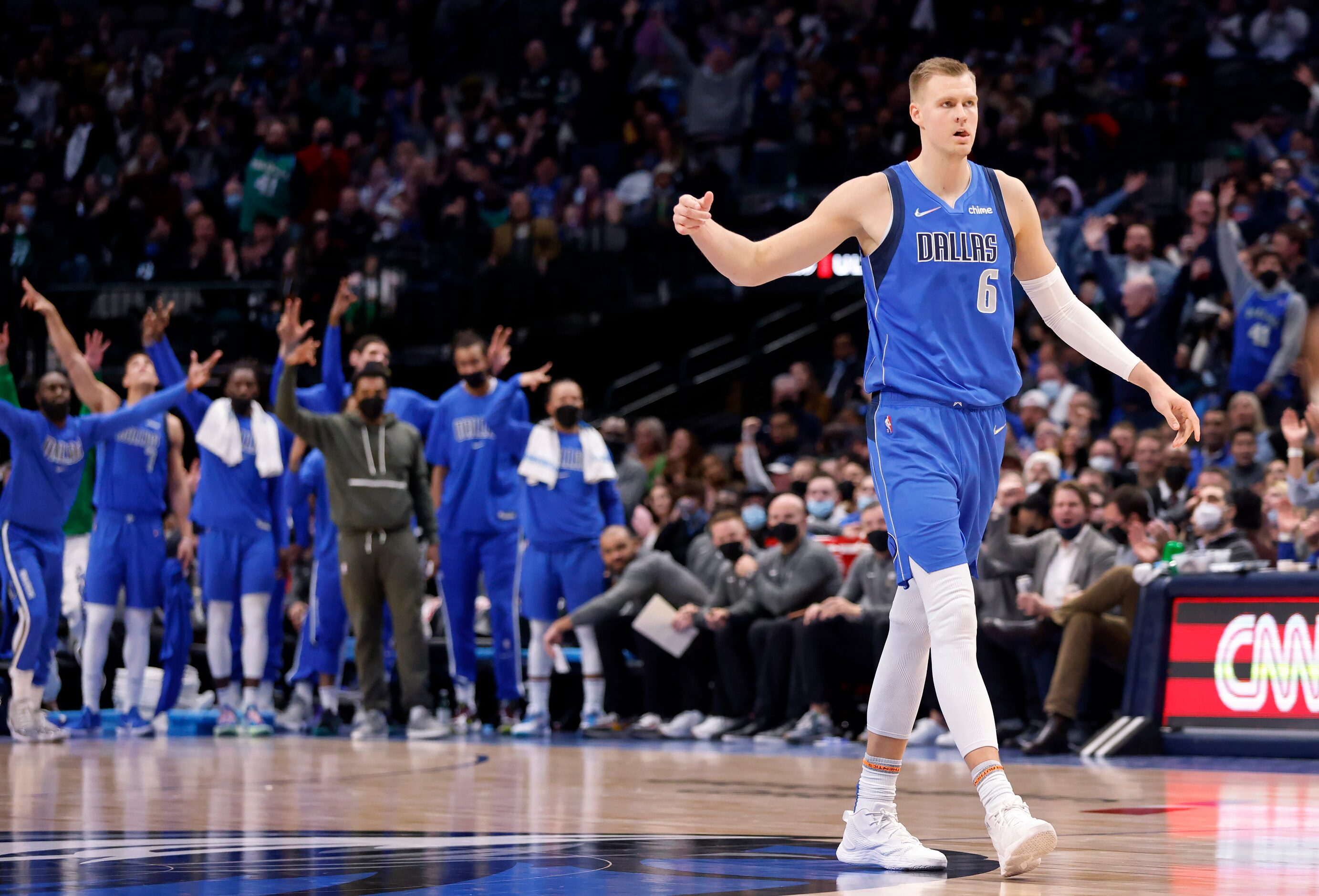 Dallas Mavericks center Kristaps Porzingis (6) reacts after he hit a big second qaurter shot...