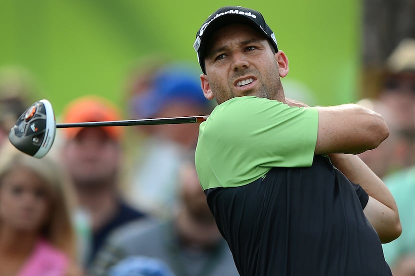 Sergio Garcia watches his drive from the 17th tee box during the first round of the Masters...