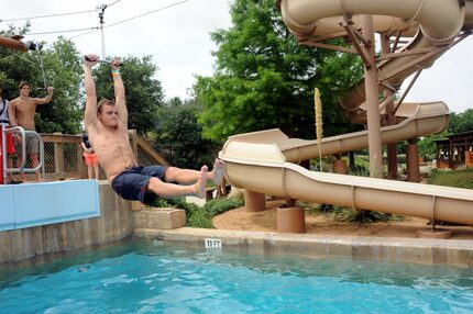 Bryce Klein zip lines across the pool at Paradise Springs at Gaylord Texan. 