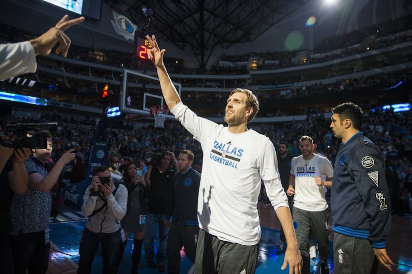 Dallas Mavericks forward Dirk Nowitzki takes the court before an NBA basketball game against...