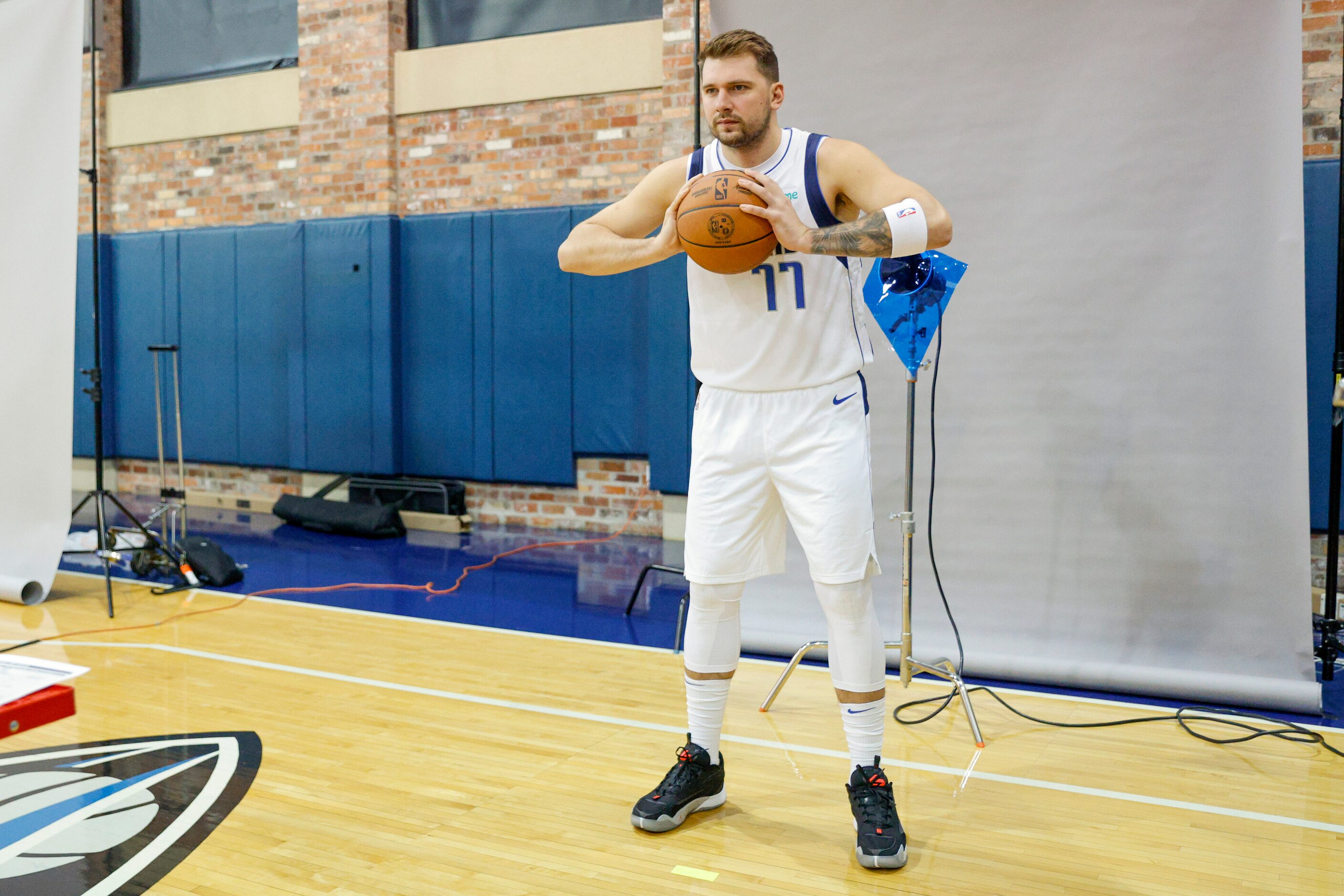 Dallas Mavericks guard Luka Doncic (77) poses for a picture during media day at American...