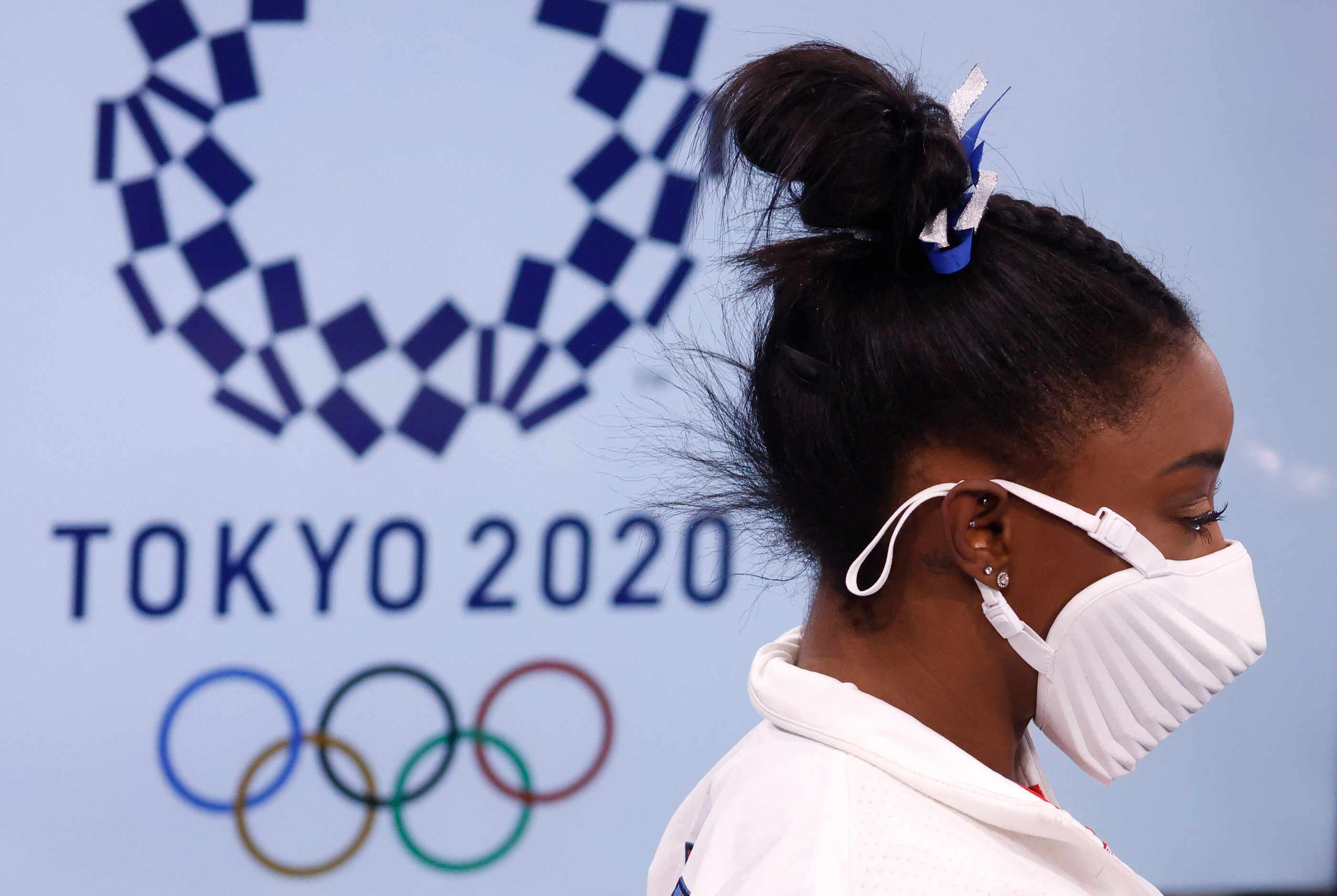 USA’s Simone Biles makes her way to the medal ceremony after winning a bronze medal in the...