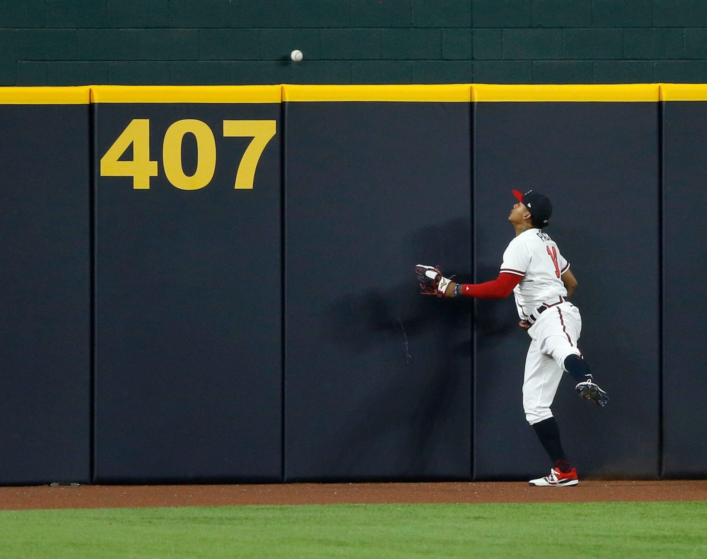 Atlanta Braves center fielder Cristian Pache (14) watches as Los Angeles Dodgers shortstop...