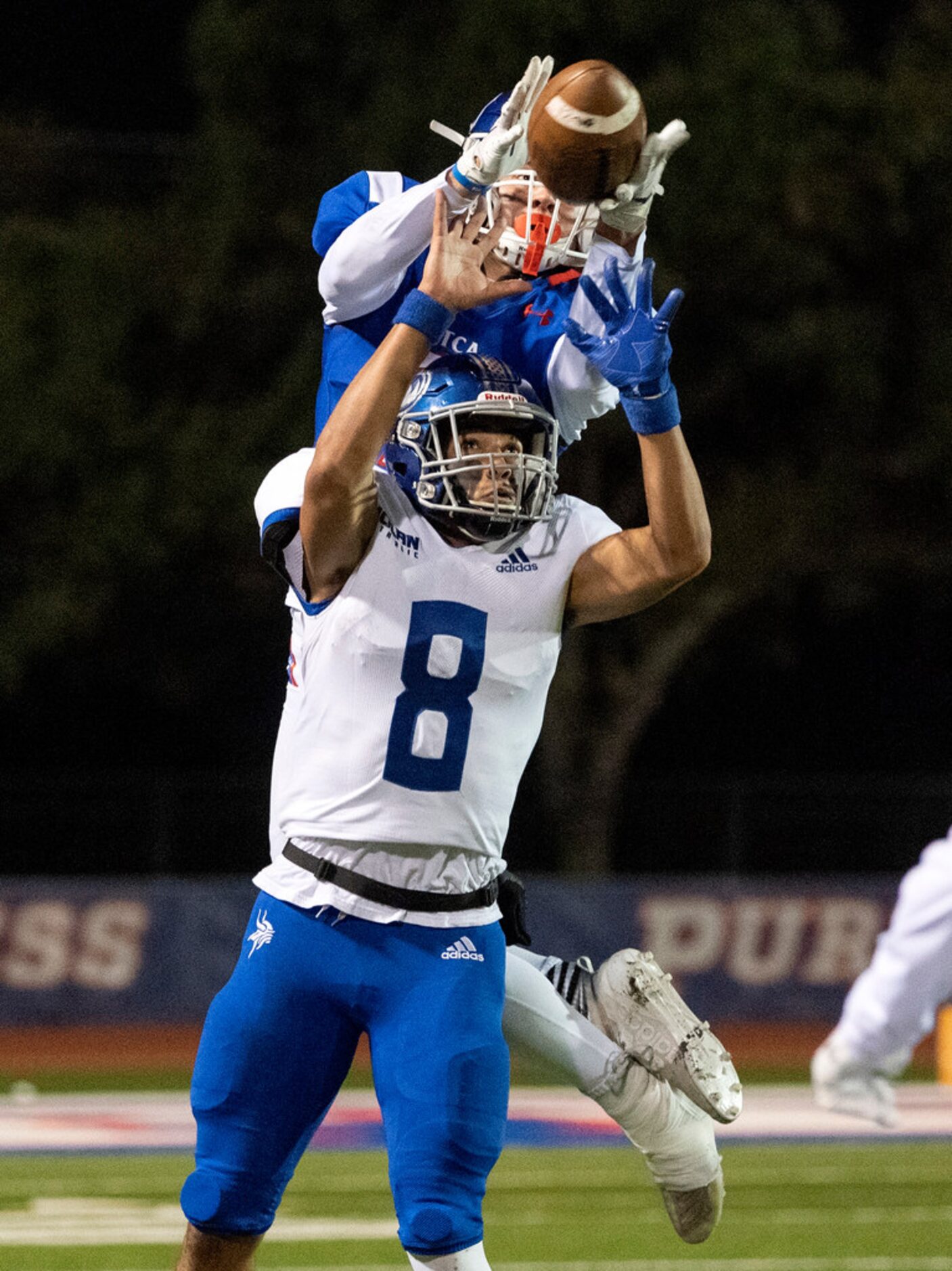 TCA-Addison wide receiver Markus Schumacher (7) pulls in a pass over Fort Worth Nolan senior...