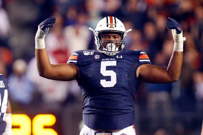 Auburn defensive tackle Derrick Brown (5) reacts after a stop against Georgia during the...