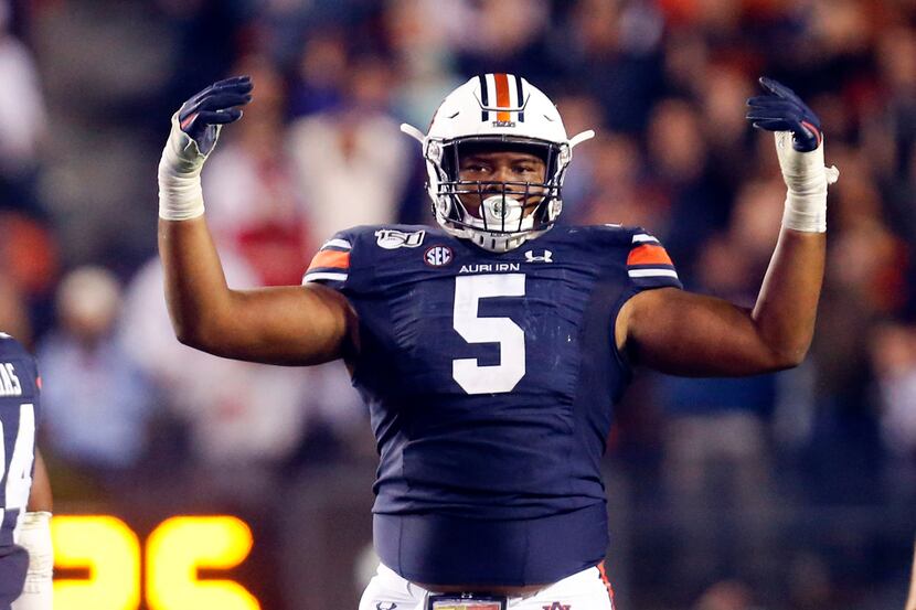 Auburn defensive tackle Derrick Brown (5) reacts after a stop against Georgia during the...